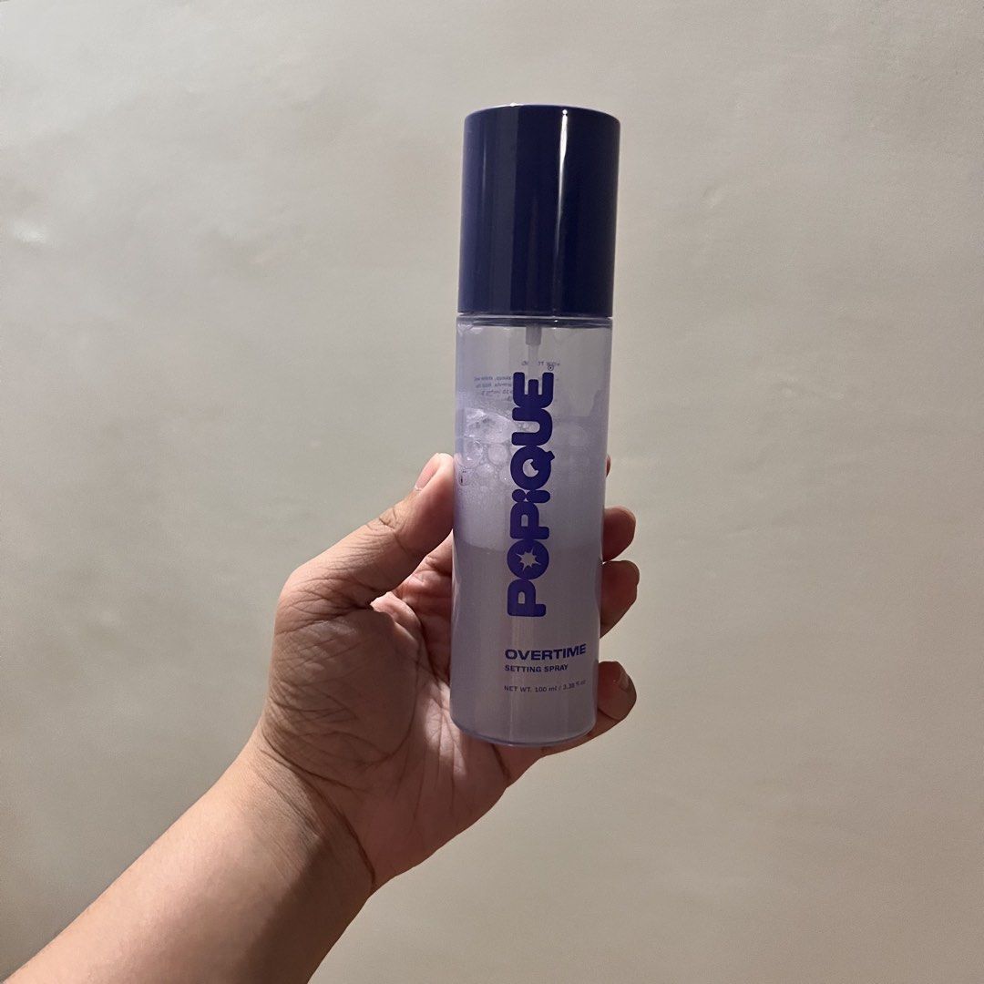 POPIQUE Setting Spray (Category: Makeup) located in Manila. Submitted by ellaurelle (Listing ID 1470728773, Image 1). Description: Has 50% of product remaining. Will give discount if bought with another oroduct I sell. 🥰 RFS: Decluttering.