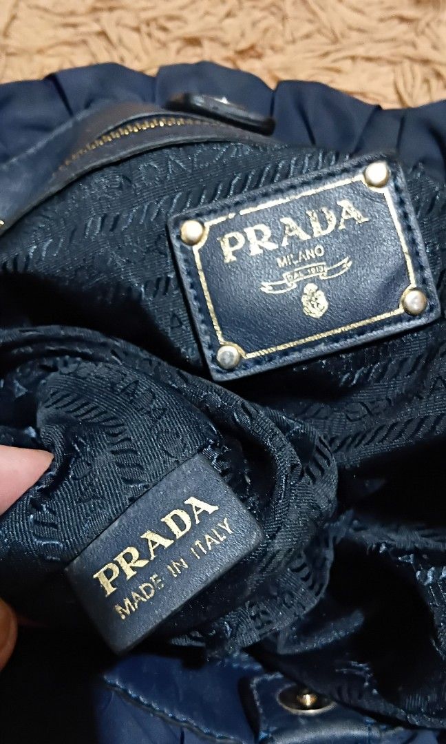 PRADA (Category: Shoulder Bags) located in Legazpi City. Submitted by nashaiza (Listing ID 1470630266, Image 3). Description: PRADA made in italy coded sign of usage sa handle/hardware lampo under zipper missing strap Japan source *authenticity not guarantee *plus shipping when you purchase MOP:GCash Courier:J&T Express.