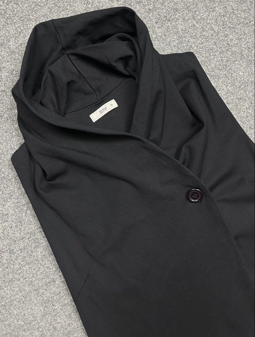 Prada - Asymmetrical Draped Sleeveless Vest Cowl Neck - Single Chest Button. (Category: Coats, Jackets and Outerwear) located in Manila. Submitted by scissor.2fifthy (Listing ID 1470600144, Image 2). Description: Prada - Asymmetrical Draped Sleeveless Vest Cowl Neck - Single Chest Button. Size: 36 (see measurement) Made in Italy Material: 100% Cotton 80/100 condition rate Used Flaw: Minor sign of usage, some dirt, small scratch and missing inner 