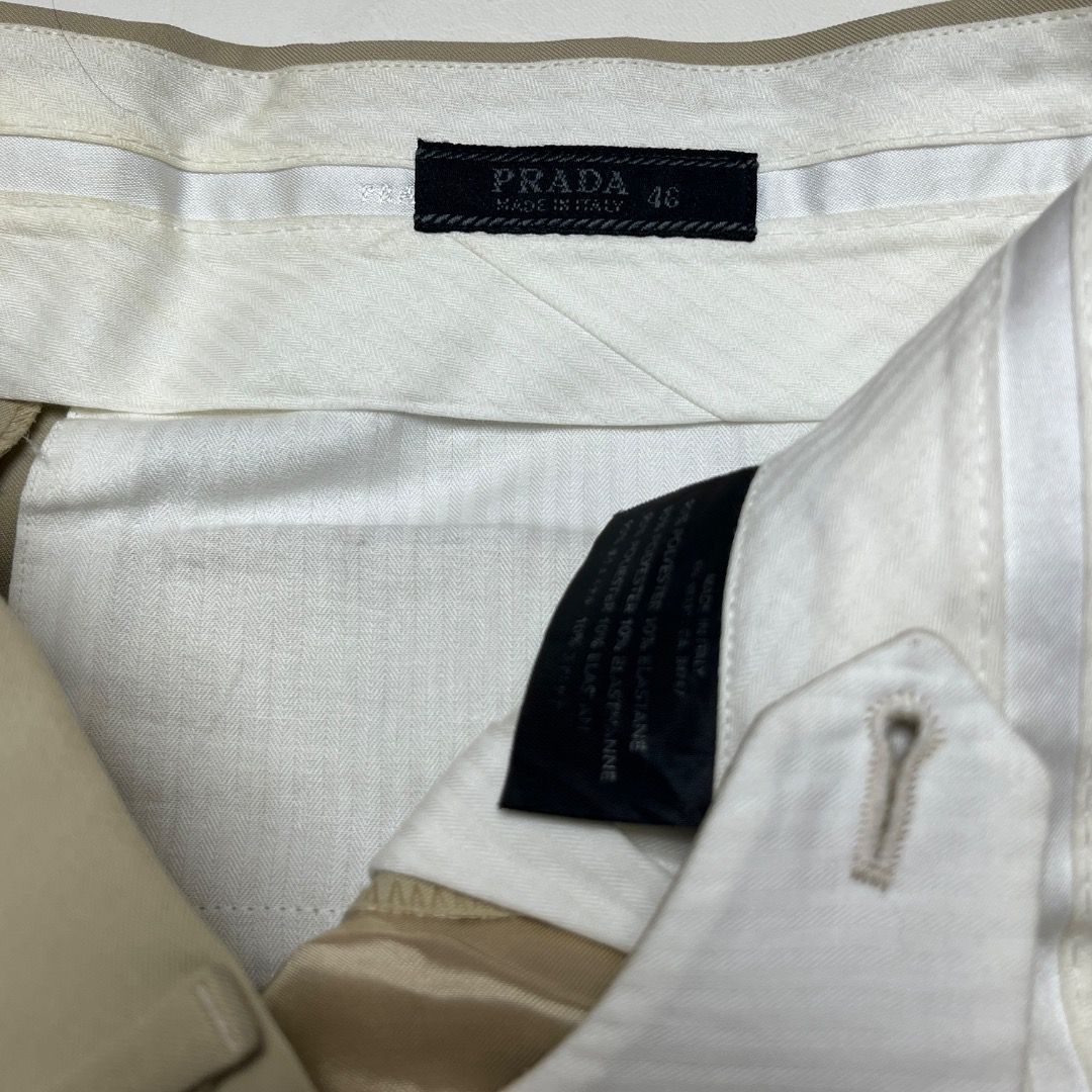 Prada Men's Beige Tailored Trousers Size 46 (Category: Trousers) located in Caloocan City. Submitted by achilles_grails (Listing ID 1470565503, Image 3). Description: - Brand: Prada - Color: Classic Beige - Size: 46 (Italian Sizing) - Fit: Straight leg - Origin: Made in Italy - Details: Clean vertical front pockets, crisp center creases, and internal branding labels intact - Style: Versatile for business meetings or smart casual looks.
