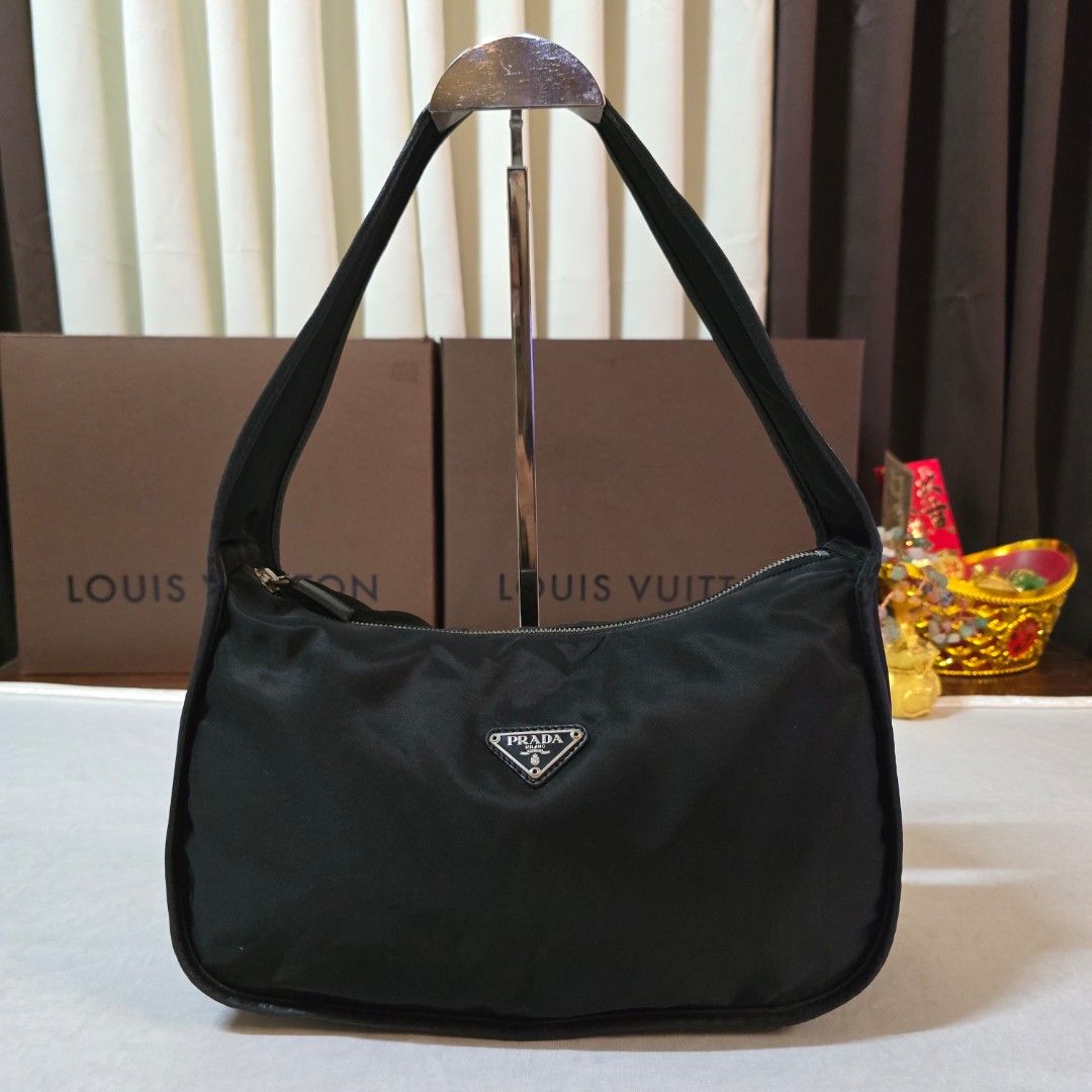 Prada Nylon Hobo Bag (Category: Luxury Bags & Wallets) located in Paranaque City. Submitted by kyshei (Listing ID 1470669627, Image 2). Description: 💯legit/,orig money back guaranteed‼️👍.