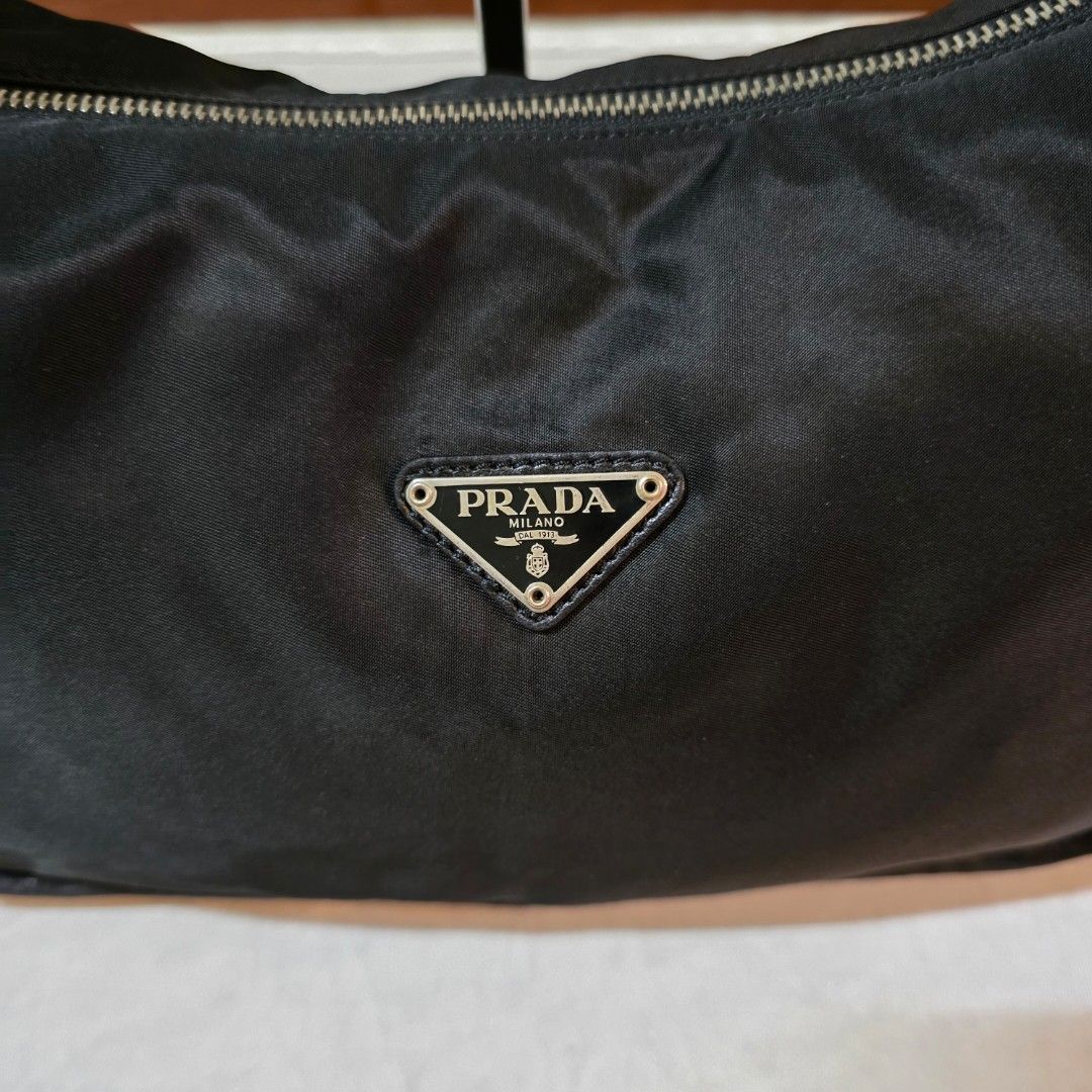 Prada Nylon Hobo Bag (Category: Luxury Bags & Wallets) located in Paranaque City. Submitted by kyshei (Listing ID 1470669627, Image 3). Description: 💯legit/,orig money back guaranteed‼️👍.