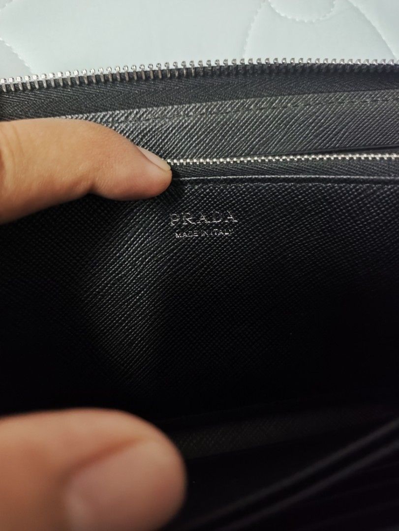 prada saffiano leather zip-round wallet (Category: Luxury Bags & Wallets) located in Bacoor. Submitted by silverdeer-ba35 (Listing ID 1470693273, Image 2). Description: forsale🔥🔥🔥 prada®️ saffiano leather zip-round wallet authentic💯 as new condition sariwa no issue ganda actual daming lagayan ng card id 10k lang yours na. bacoor cavite ph. location DM📩 sure buyer..tnxxx.