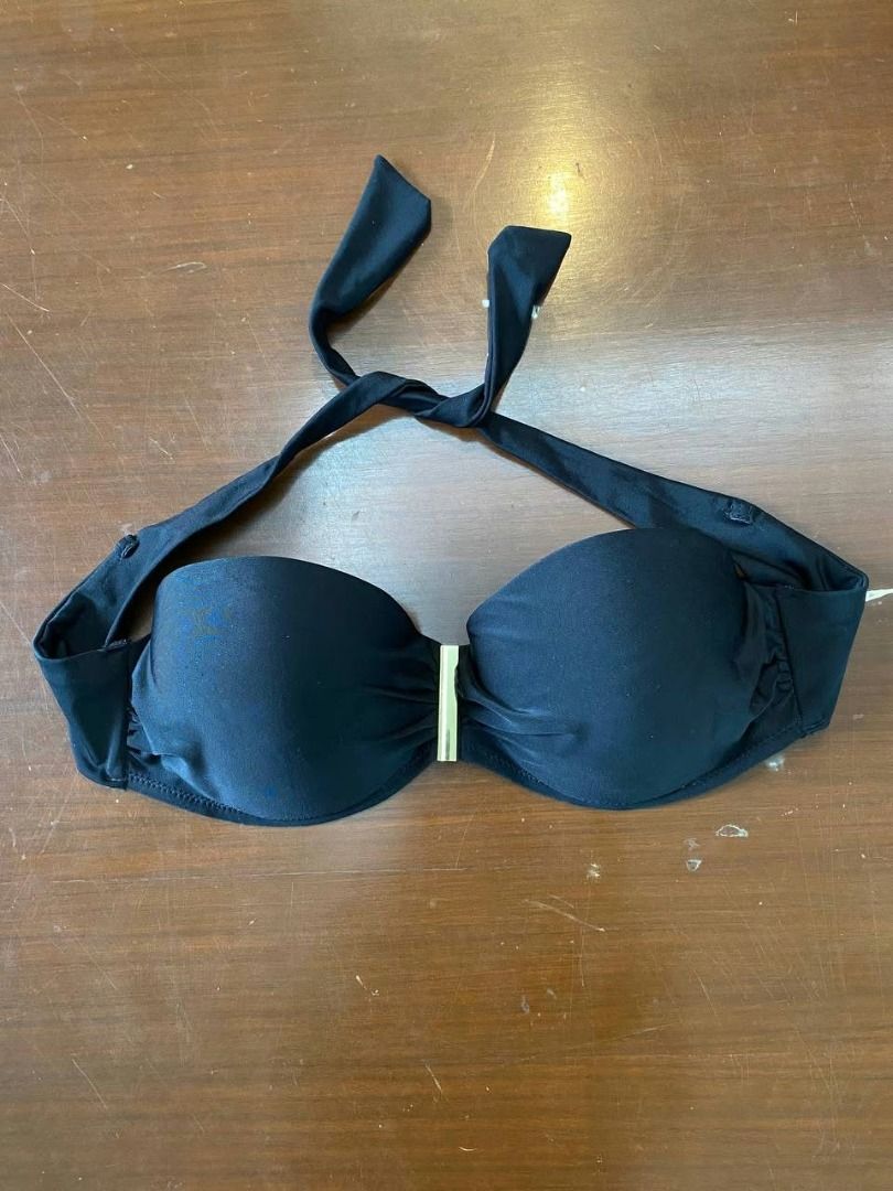 Preloved Coco Cabana Bikini Top L (Category: Bikinis & Swimsuits) located in Muntinlupa City. Submitted by irene.aragon.navarro (Listing ID 1470624680, Image 1). Description: Black bikini top, halter neck tie style. Underwire support cups with gentle gathering. Gold-tone metal bar piece right between the cups. Clean fabric, solid black color throughout. Great piece for beach trips or pool days..