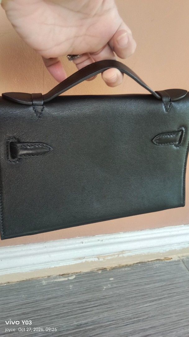 Preloved Hermes Black Leather Top Handle Handbag Gold Hardware (Category: Luxury Bags & Wallets) located in Cabuyao City. Submitted by selections888 (Listing ID 1470588348, Image 2). Description: - preloved from Japan supplier - Premium black leather material - Elegant top handle with secure gold clasp closure - Structured shape with expandable gusseted sides - Neat, clean stitching along the front flap and straps - Compact and practical size for