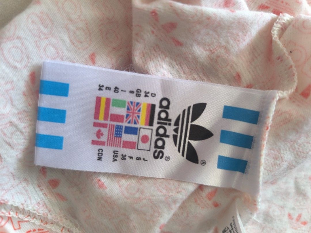 Preloved/ukay Adidas halter racerback top (Category: Sleeveless) located in Manila. Submitted by lianlim.mail (Listing ID 1470563762, Image 3). Description: Preloved/ukay Adidas halter racerback top size 34 (estimate XS to S).