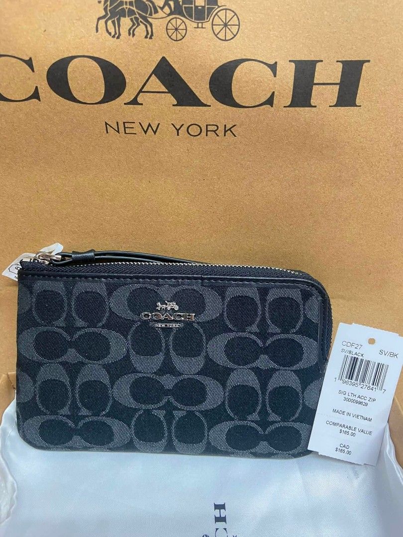 Premium Quality Signature Wristlet with Strap (Category: Wallets & Card holders) located in Manila. Submitted by k2collection.mnl (Listing ID 1470726707, Image 3). Description: 💜 SIGNATURE WRISTLET — COMPLETE INCLUSIONS 💜 ✨ Stylish and classy, perfect for everyday use or gifting! 🎁 COMPLETE INCLUSIONS: ✔️ Wristlet wallet ✔️ Wrist strap ✔️ Hang tag ✔️ Dust bag ✔️ Box packaging.