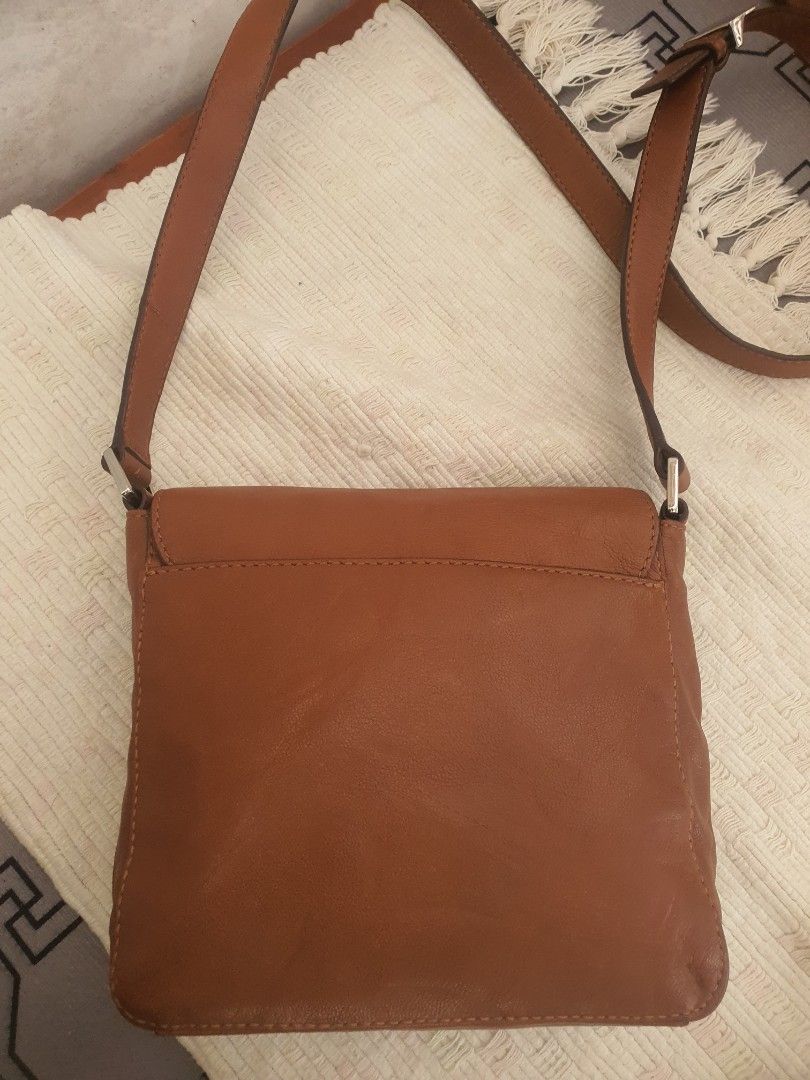 Pretty michael kors (Category: Cross-body Bags) located in Trece Martires City. Submitted by thriftollshoppe (Listing ID 1470565205, Image 2). Description: pure leather og michael kors no flaws minimal press mark only.