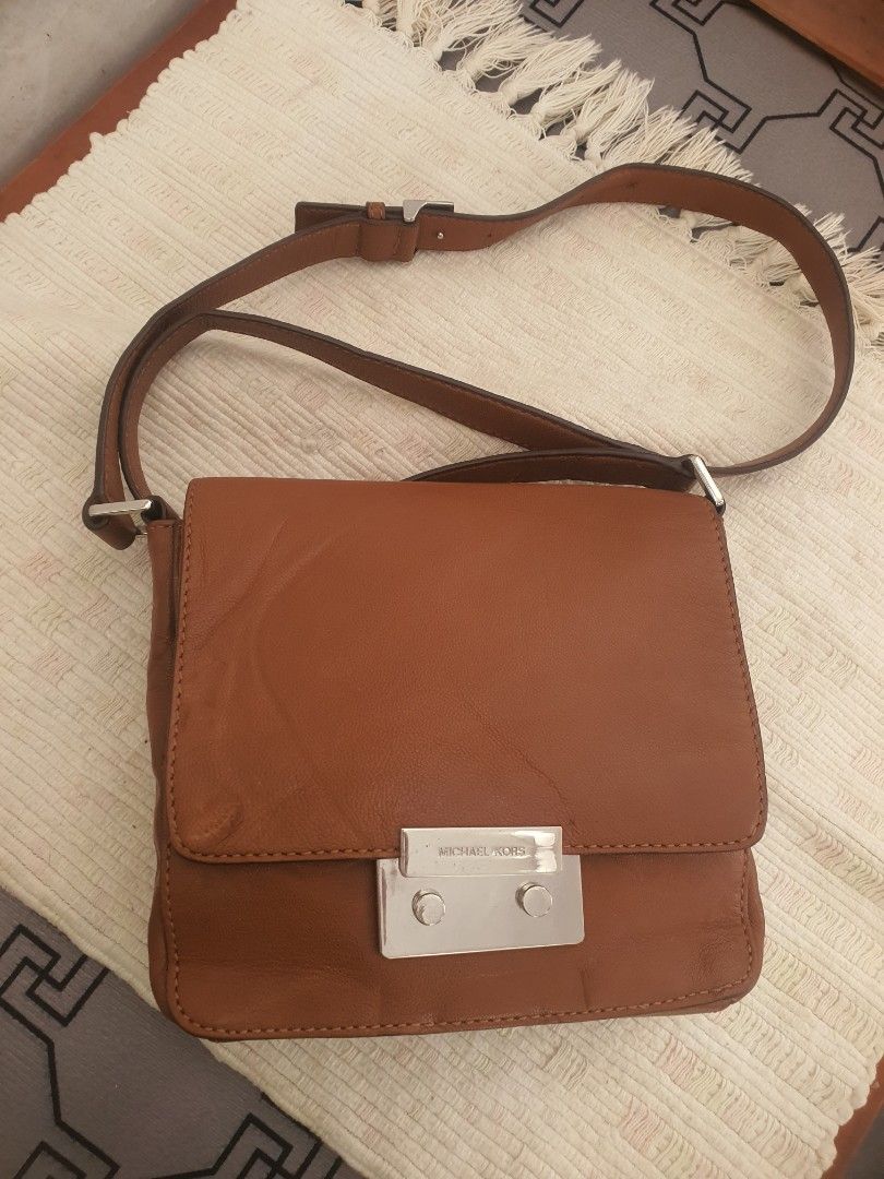 Pretty michael kors (Category: Cross-body Bags) located in Trece Martires City. Submitted by thriftollshoppe (Listing ID 1470565205, Image 1). Description: pure leather og michael kors no flaws minimal press mark only.