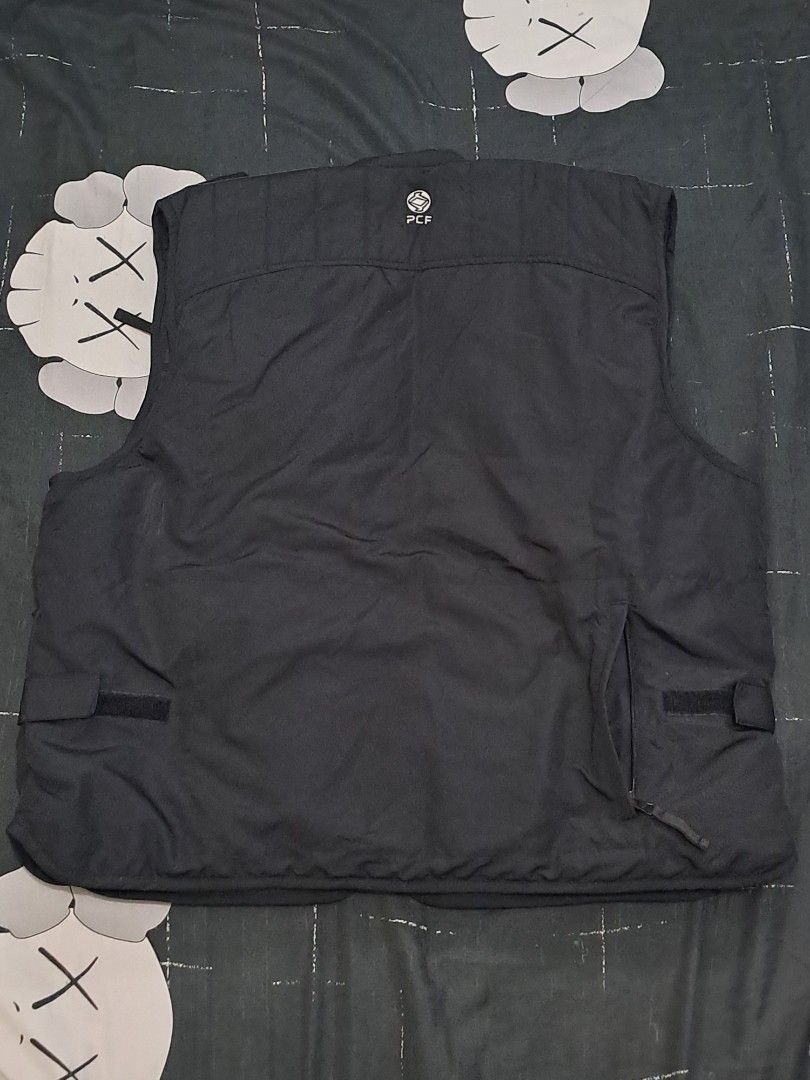 Pro Cam-Fis Black Utility Vest with Multiple Pockets (Category: Vests) located in Puerto Princesa. Submitted by jercksthriftph (Listing ID 1470654986, Image 2). Description: - Brand/Model: Pro Cam-Fis Utility Vest - Color: Black - Pockets: Loaded with functional pockets on chest and lower front panels for gear and accessories - Closure: Durable center zip with branded patches - Design: Practical sleeveless style, great for layering - Ideal For: O