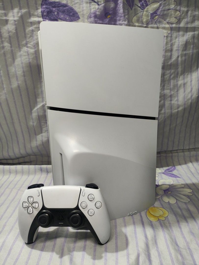 PS5 Slim 1TB (Category: PlayStation) located in Pasig City. Submitted by jarenzz (Listing ID 1470570628, Image 1). Description: - Item: Sony PlayStation 5 Standard Edition - Color: White - Inclusions: 1x Original DualSense wireless controller - No issue - Condition: Clean body, minimal dust, well-maintained grip areas and buttons - Performance: 100% working properly, ready for your gaming setup Fix price not rush - Delivery: Local meetup availabl