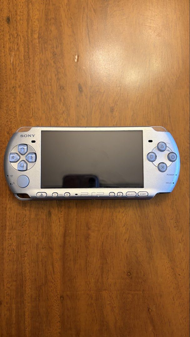 PSP 3000 (modded) (Category: PlayStation) located in Quezon City. Submitted by juannnndlcr (Listing ID 1470612807, Image 3). Description: Selling my Sony PSP 3000 Silver in good working condition. Fully functional and modded, with some minor scratches and signs of use. Inclusions: • Sony PSP 3000 Silver (Modded) • Original PSP Camera (Working, PSP-450) • PSP Charger and Power Adapter • Clear Protective Case • Charging Adapter Condition: • 7.5/10 