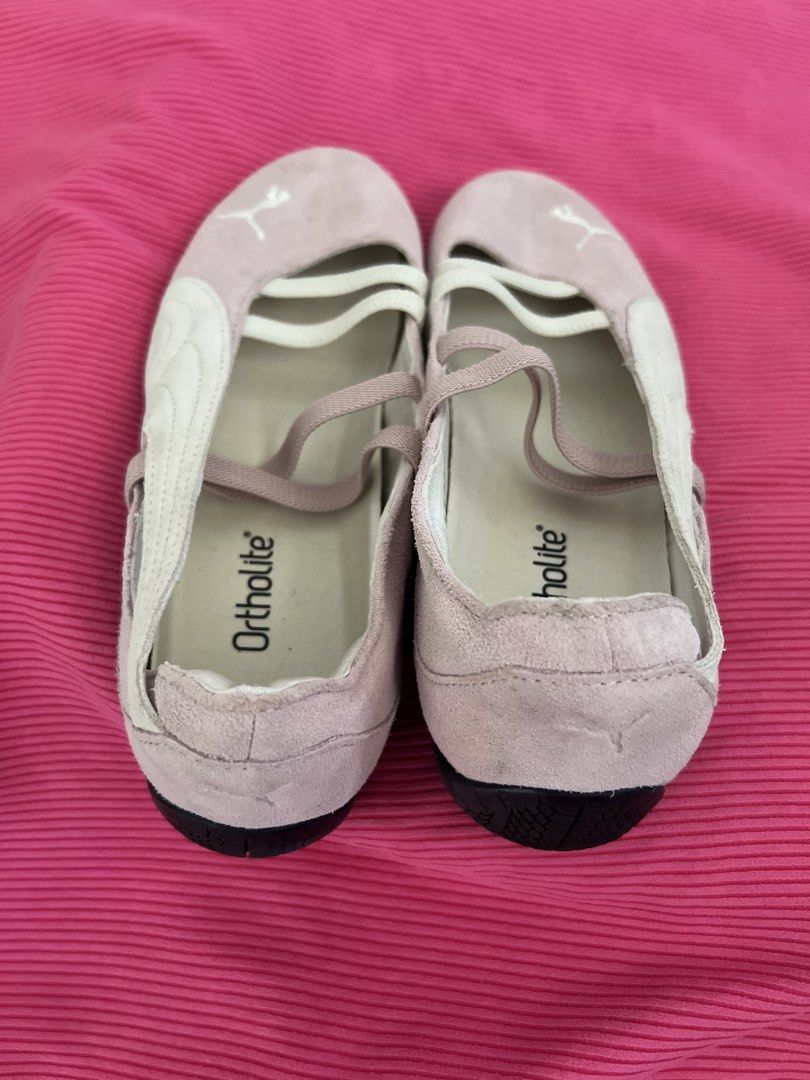 Puma pink ballet flats sneakers (Category: Flats & Sandals) located in Manila. Submitted by zellie11 (Listing ID 1470560863, Image 2). Description: - Color & Style: Pink with white accents, strappy crossover design, and iconic Puma cat logo on the toe and heel - Comfort: Ortholite insoles for extra cushioning and a convenient slip-on style - Durability: Rubber soles with good grip and tread - Condition: Pre-loved with slight scuffs near the front