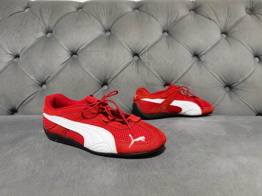 Puma speedcat go (Category: Sneakers) located in Calamba. Submitted by saiphsavion (Listing ID 1470627689, Image 1). Description: - Brand: Puma - Color: Bold red with iconic white formstripes - Material: Breathable mesh upper with premium suede overlays - Design Details: Embroidered white Puma cat logo on the toe box, slim profile, and thin red laces - Soles: Black rubber outsoles with zero visible wear - Condition: Clean and well-maintained over