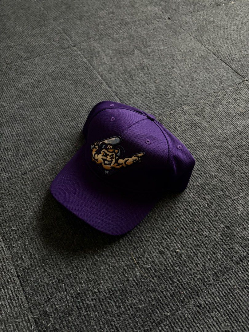 Purple Baseball Cap with Mascot Patch (Category: Caps & Hats) located in Manila. Submitted by toys_hats005 (Listing ID 1470628946, Image 1). Description: - Color: Purple with a cool character mascot patch on the front - Material: Lightweight, breathable mesh-like construction - Fit: Adjustable strapback closure to fit most head sizes - Details: Contrast grey underside on the brim and a clean interior with a black sweatband - Style: Perfect, easyg