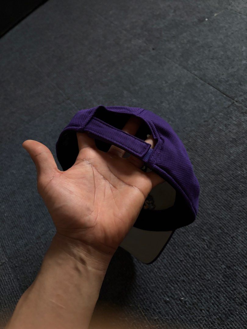 Purple Baseball Cap with Mascot Patch (Category: Caps & Hats) located in Manila. Submitted by toys_hats005 (Listing ID 1470628946, Image 2). Description: - Color: Purple with a cool character mascot patch on the front - Material: Lightweight, breathable mesh-like construction - Fit: Adjustable strapback closure to fit most head sizes - Details: Contrast grey underside on the brim and a clean interior with a black sweatband - Style: Perfect, easyg