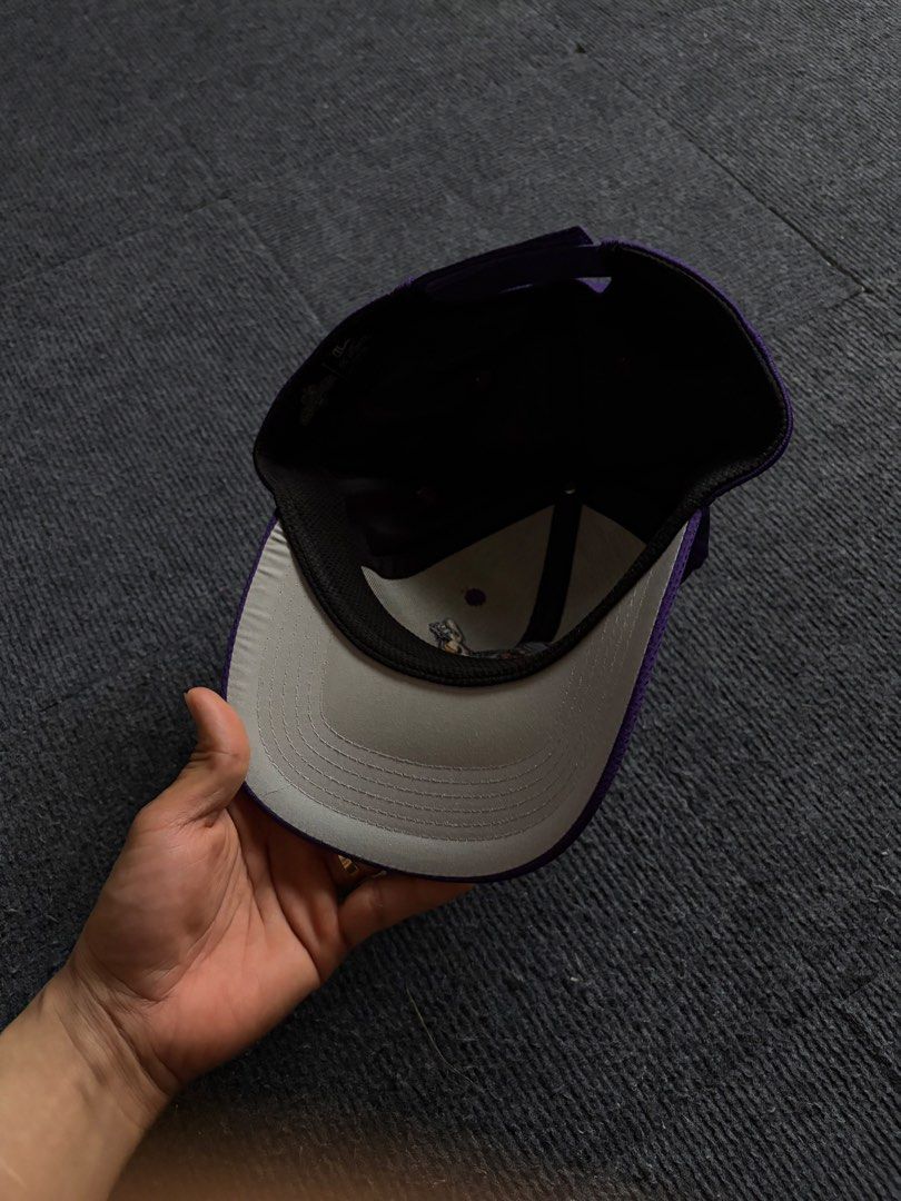 Purple Baseball Cap with Mascot Patch (Category: Caps & Hats) located in Manila. Submitted by toys_hats005 (Listing ID 1470628946, Image 3). Description: - Color: Purple with a cool character mascot patch on the front - Material: Lightweight, breathable mesh-like construction - Fit: Adjustable strapback closure to fit most head sizes - Details: Contrast grey underside on the brim and a clean interior with a black sweatband - Style: Perfect, easyg