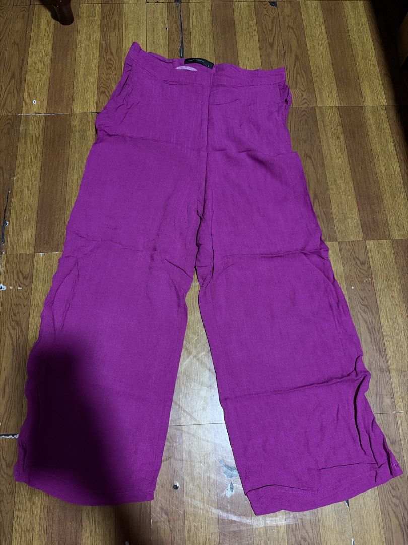 Purple Wide Leg Pants Size L (Category: Jeans) located in Manila. Submitted by annabananna (Listing ID 1470681827, Image 1). Description: - Color: Bright purple - Size: L - Fit: Comfy, relaxed straight cut - Features: Deep side pockets - Style: Great for casual outings or lounging at home - Easy to pair with basic tops and tees.