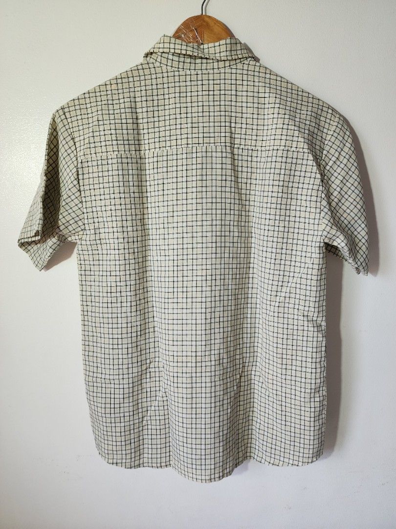 Quiksilver Checked Short Sleeve Button Up Polo (Category: Tshirts & Polo Shirts ) located in Meycauayan. Submitted by MP_Shop (Listing ID 1470577180, Image 2). Description: Size: 19W x 26.5L inches Excellent Condition Color rate: 9/10 Loc: Meycauayan Bulacan Courier: J&T Mop: Gcash.