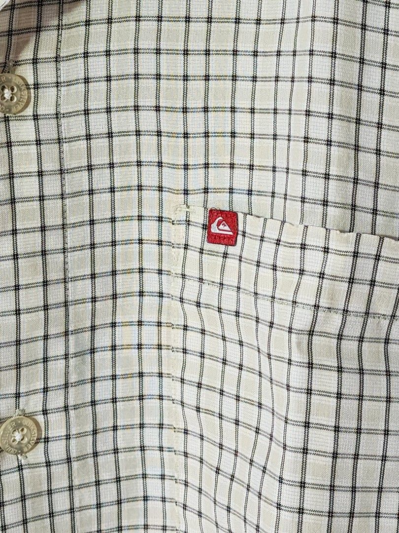 Quiksilver Checked Short Sleeve Button Up Polo (Category: Tshirts & Polo Shirts ) located in Meycauayan. Submitted by MP_Shop (Listing ID 1470577180, Image 3). Description: Size: 19W x 26.5L inches Excellent Condition Color rate: 9/10 Loc: Meycauayan Bulacan Courier: J&T Mop: Gcash.