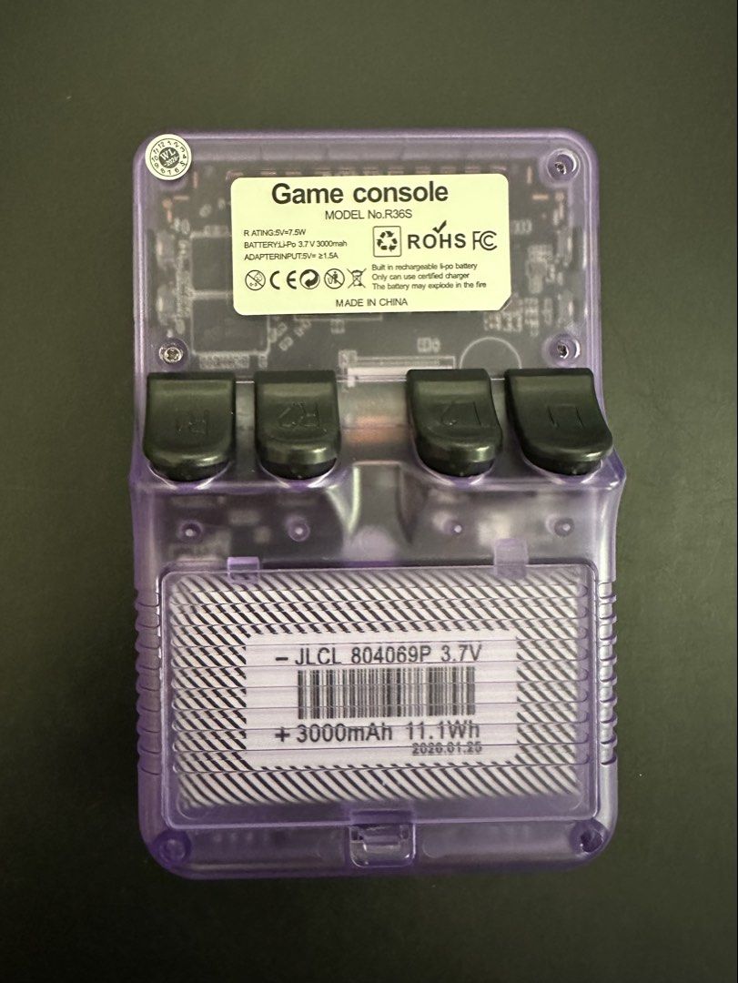 R36S Game Console (128GB) (Category: Other Gadgets) located in Batangas. Submitted by batang90s_ako (Listing ID 1470606729, Image 3). Description: R36S Game Console - Original / Authentic - DarkOS RE - 2 Ram chips - color transparent purple - 128 GB sd card - 20,000 retro games included - Opened for testing purposes only and returned to its original box. RFS: need funds .