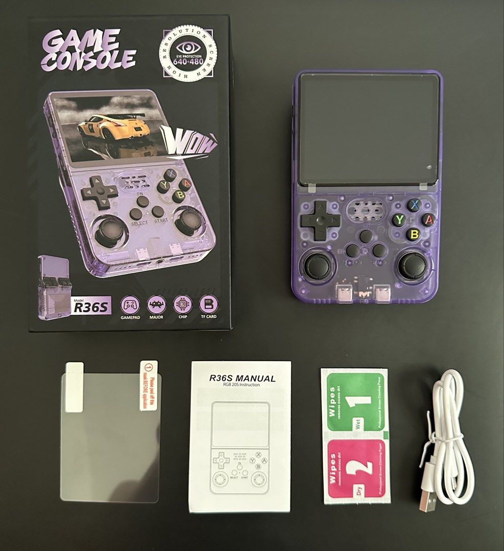 R36S Game Console (128GB) (Category: Other Gadgets) located in Batangas. Submitted by batang90s_ako (Listing ID 1470606729, Image 2). Description: R36S Game Console - Original / Authentic - DarkOS RE - 2 Ram chips - color transparent purple - 128 GB sd card - 20,000 retro games included - Opened for testing purposes only and returned to its original box. RFS: need funds .
