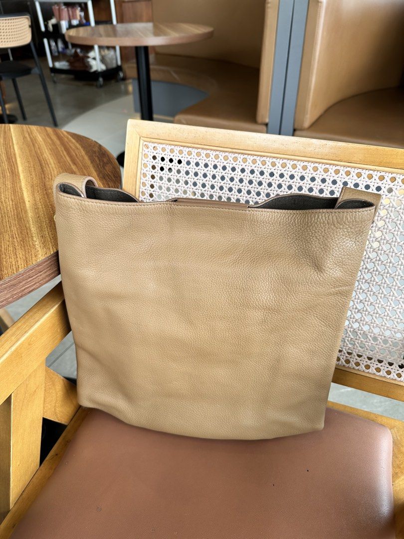 Rabeanco JHU Bag (Category: Shoulder Bags) located in Baguio. Submitted by judyannlacaden (Listing ID 1470607078, Image 2). Description: - Color: Versatile taupe that goes with everything - Material: Soft, pebble-grained leather - Design: Comfortable wide shoulder strap with a simple open-top closure - Capacity: Spacious interior with plenty of room for daily essentials.