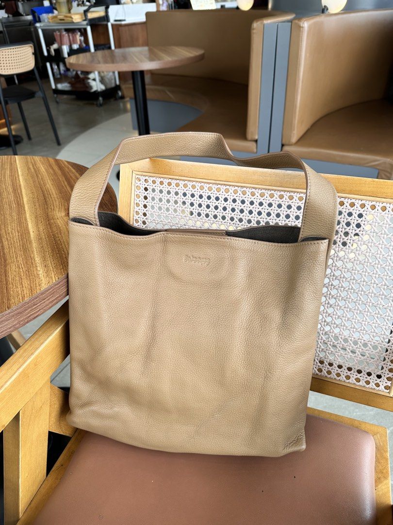 Rabeanco JHU Bag (Category: Shoulder Bags) located in Baguio. Submitted by judyannlacaden (Listing ID 1470607078, Image 1). Description: - Color: Versatile taupe that goes with everything - Material: Soft, pebble-grained leather - Design: Comfortable wide shoulder strap with a simple open-top closure - Capacity: Spacious interior with plenty of room for daily essentials.