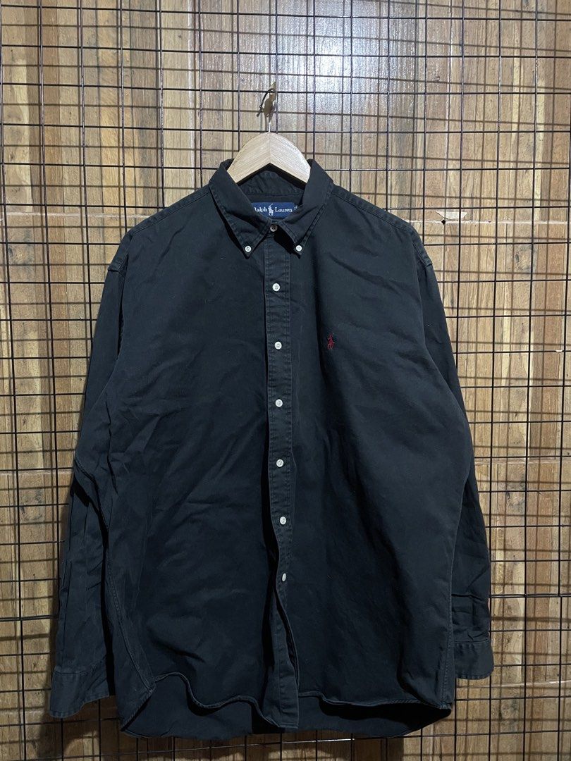 Ralph lauren black button down shirt (Category: Formal Shirts) located in Pateros City. Submitted by toogood.mnl (Listing ID 1470598988, Image 1). Description: Ralph lauren button up long sleeve shirt Made in Philippines W-26 L-31 No issue Excellent condition .