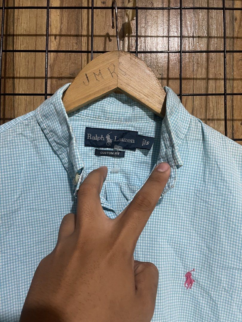 Ralph Lauren checkered blue button down (Category: Formal Shirts) located in Pateros City. Submitted by toogood.mnl (Listing ID 1470633678, Image 3). Description: Ralph Lauren blue checkered button down shirt W-21 L-28 No issue Excellent condition .