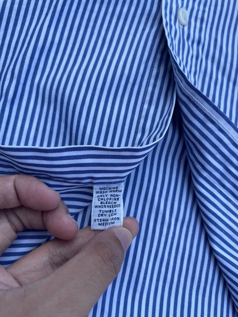 Ralph Lauren Classic Fit Striped Button-Down Shirt (Category: Tshirts & Polo Shirts ) located in Tarlac. Submitted by supremo.0 (Listing ID 1470563524, Image 3). Description: - Brand: Ralph Lauren - Color/Pattern: Blue and white striped - Fit: Classic fit - Size: 16 1/2 (26.5x 32) - Details: Button-down collar, front placket, long sleeves with buttoned cuffs, embroidered pony logo - Care: Machine wash warm - Origin: Made in Hong Kong.