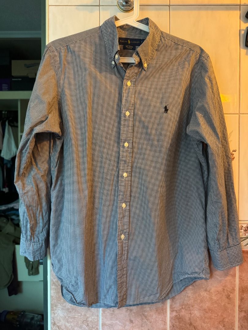 Ralph Lauren Gingham Check Button Down Shirt Medium (Category: Tshirts & Polo Shirts ) located in Cebu City. Submitted by _t.rix (Listing ID 1470578211, Image 1). Description: - Brand: Ralph Lauren - Pattern: Black and white gingham check - Size: Medium - Material: 100% cotton stretch fabric - Features: Classic collar, front button closure, long sleeves, and signature embroidered polo player logo - Origin: Made in Sri Lanka - Condition: Clean and