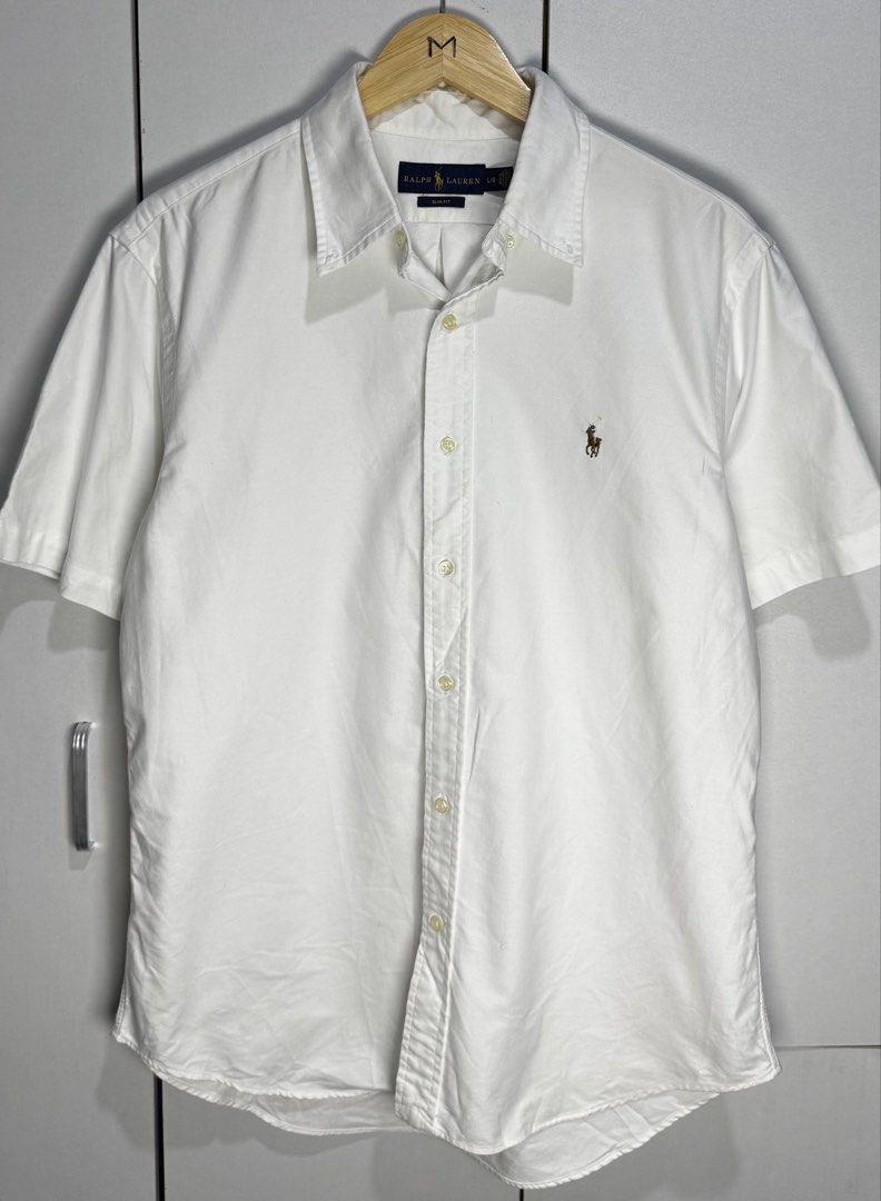 Ralph Lauren short sleeve (Category: Formal Shirts) located in Subic. Submitted by notstyl (Listing ID 1470707553, Image 1). Description: RL white tricolor pony (Oxford) 22 x 28/29 (Large/SF) Excellent condition.