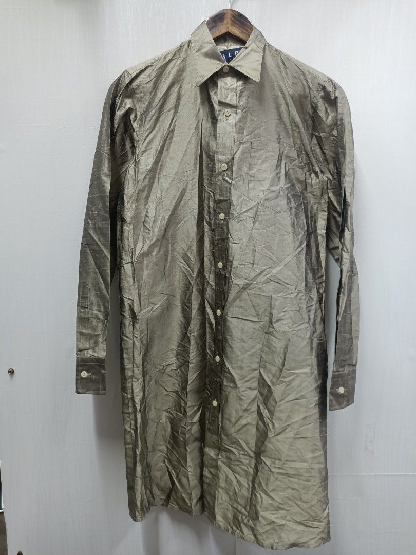 Ralph Lauren Silk Dress Button Down (Category: Longsleeves) located in Bayombong. Submitted by rheaaa00530 (Listing ID 1470664895, Image 1). Description: - Brand: Ralph Lauren - Style: Long sleeve button-down Dress with classic collar and single button cuffs - Color/Finish: Shimmering greyish-gold metallic hue - Material: 100% Raw Silk (Soie), lightweight with natural textured wrinkling - Size: 2 (Tagged) - Origin: Crafted in Hong Kong - Conditio
