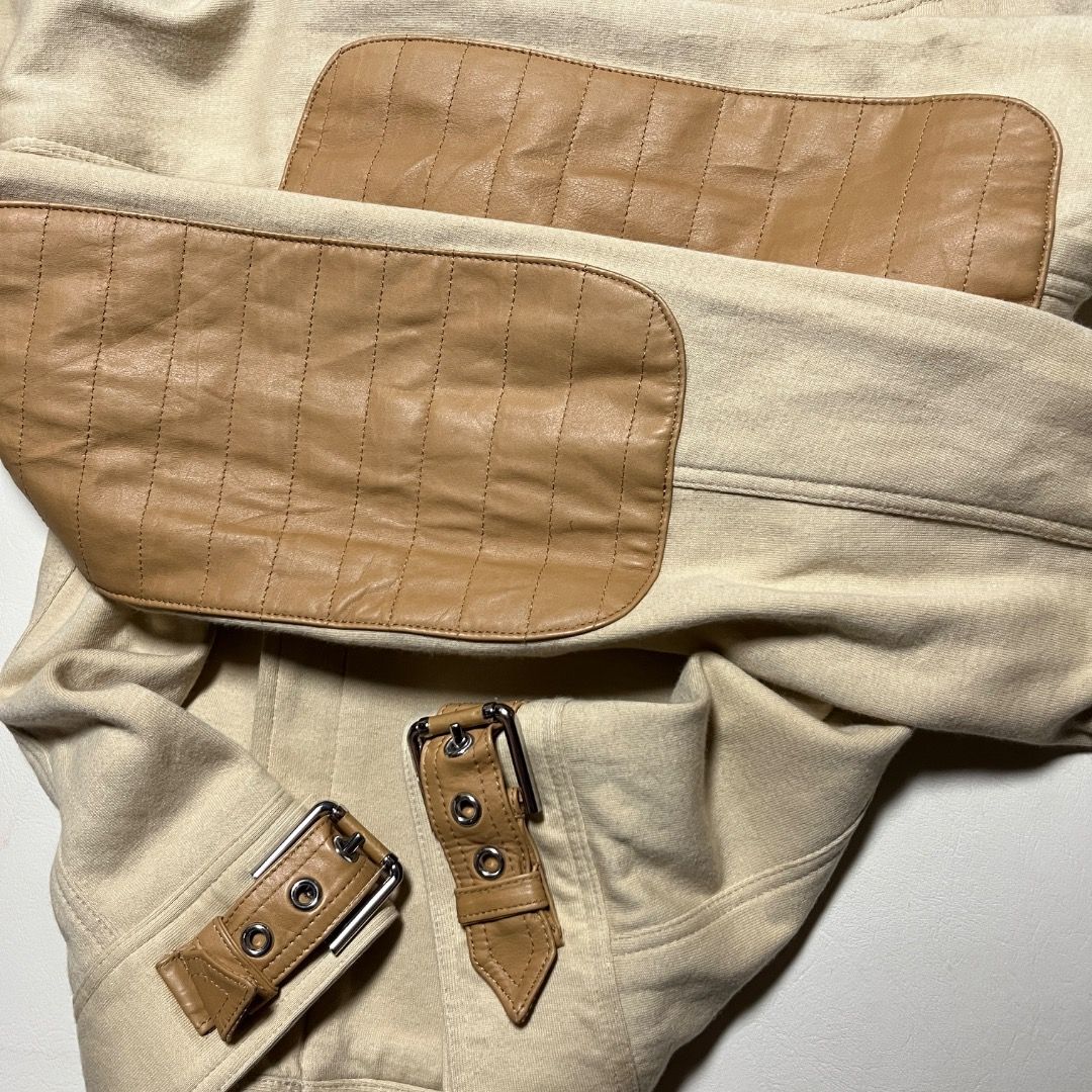 Ralph Lauren Tan Leather Accented Jacket (Category: Coats, Jackets and Outerwear) located in Caloocan City. Submitted by achilles_grails (Listing ID 1470727996, Image 3). Description: - Brand: Ralph Lauren - Size: 4 - Color: Beige with tan leather accents - Collar & Shoulders: Contrast tan leather collar and shoulder panels with stand-up double-snap closure - Closure: Asymmetrical front zipper - Pockets: Large utility chest pocket with zippered c