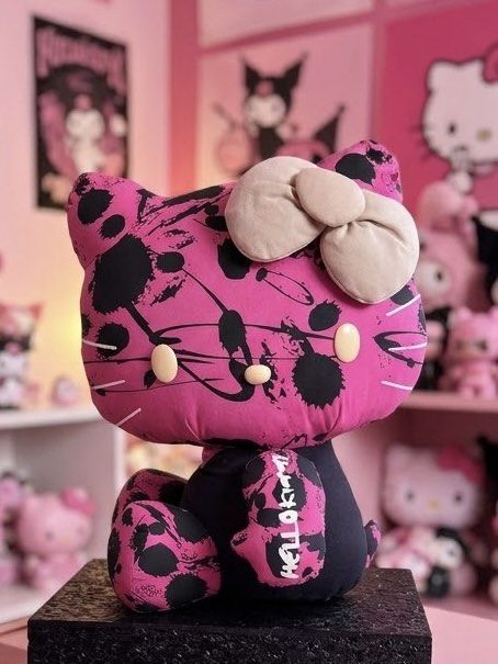 RARE Large Hello Kitty Punk Splatter Print Plush Doll (Category: Plushies & Soft Toys) located in Manila. Submitted by serendipitymanila (Listing ID 1470700427, Image 1). Description: - Authentic RARE Kitty plush doll in a rare pink and black splatter print design - Features a solid black body/limbs, neutral gray bow - Condition note: Small seam repair needed under the right armpit (slight white stuffing exposed, easy DIY fix) - Super huggable an