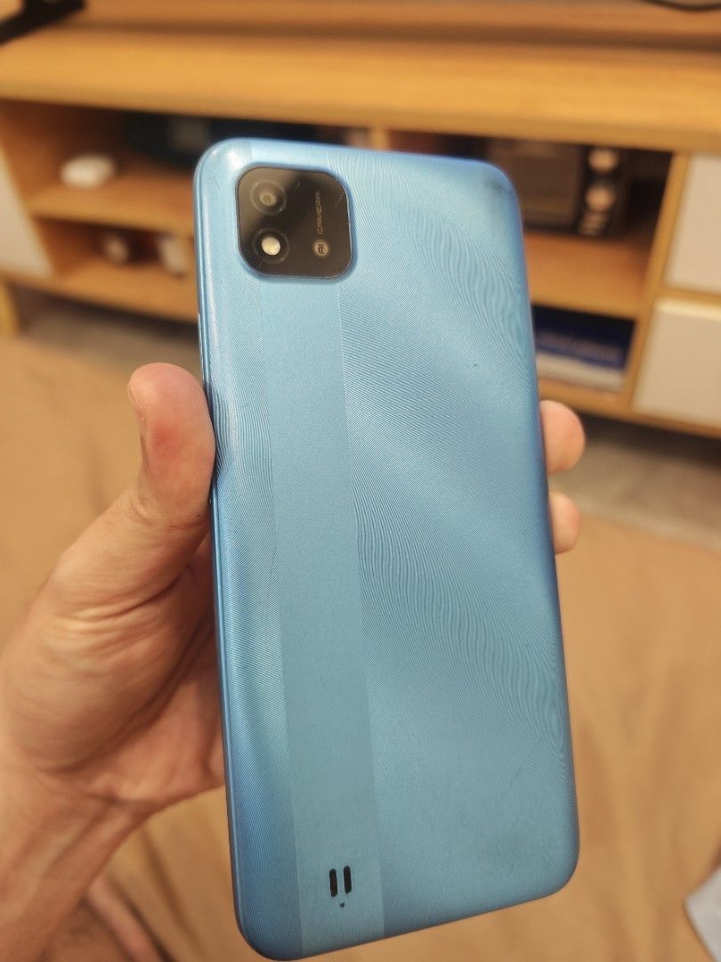 Realme c11 blue slighly used only (Category: Realme) located in Malabon City. Submitted by neon.neon2 (Listing ID 1470728737, Image 2). Description: Selling rush! 2k fix only! Realme c11 blue Unit only Slightly used bata lang kasi gumamit Slight issue side buttons medyo lubog lang other that that wala ng ibang issue Reason for selling walang gumagamit nakatabi lang sa cabinet Message me if intrested Location malabon city Meet up sm grandcentral/c