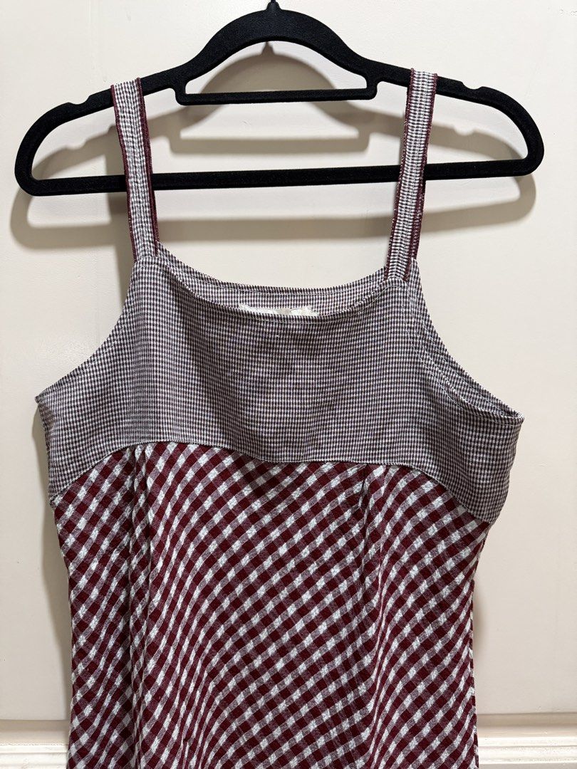 Red and white checkered mini dress with ruffle hem (Category: Dresses) located in Davao. Submitted by 2ndbase.dvo.ii (Listing ID 1470598525, Image 3). Description: - Red and white checkered mini dress - Strappy design - Comfortable smocked bodice - Flared skirt with a small ruffled hem - Great for warm weather and casual days out.