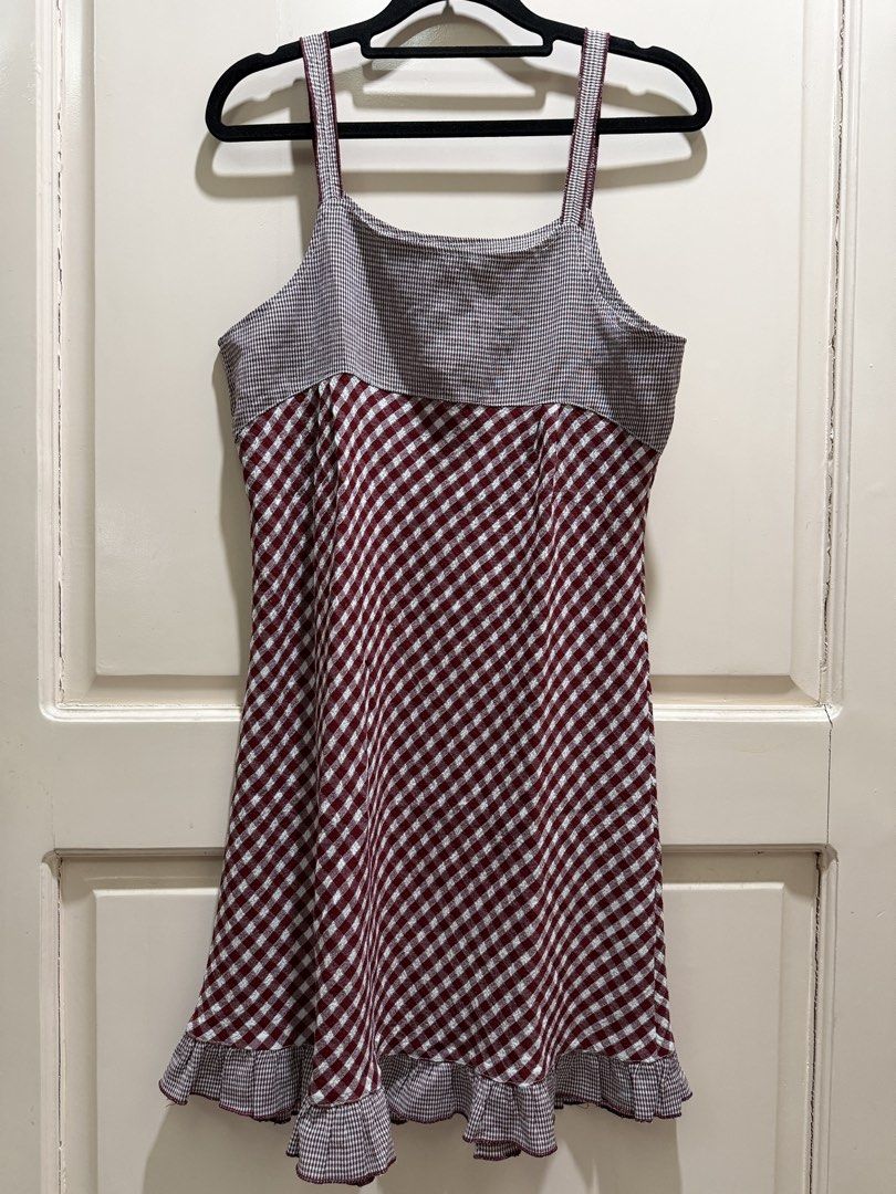 Red and white checkered mini dress with ruffle hem (Category: Dresses) located in Davao. Submitted by 2ndbase.dvo.ii (Listing ID 1470598525, Image 2). Description: - Red and white checkered mini dress - Strappy design - Comfortable smocked bodice - Flared skirt with a small ruffled hem - Great for warm weather and casual days out.