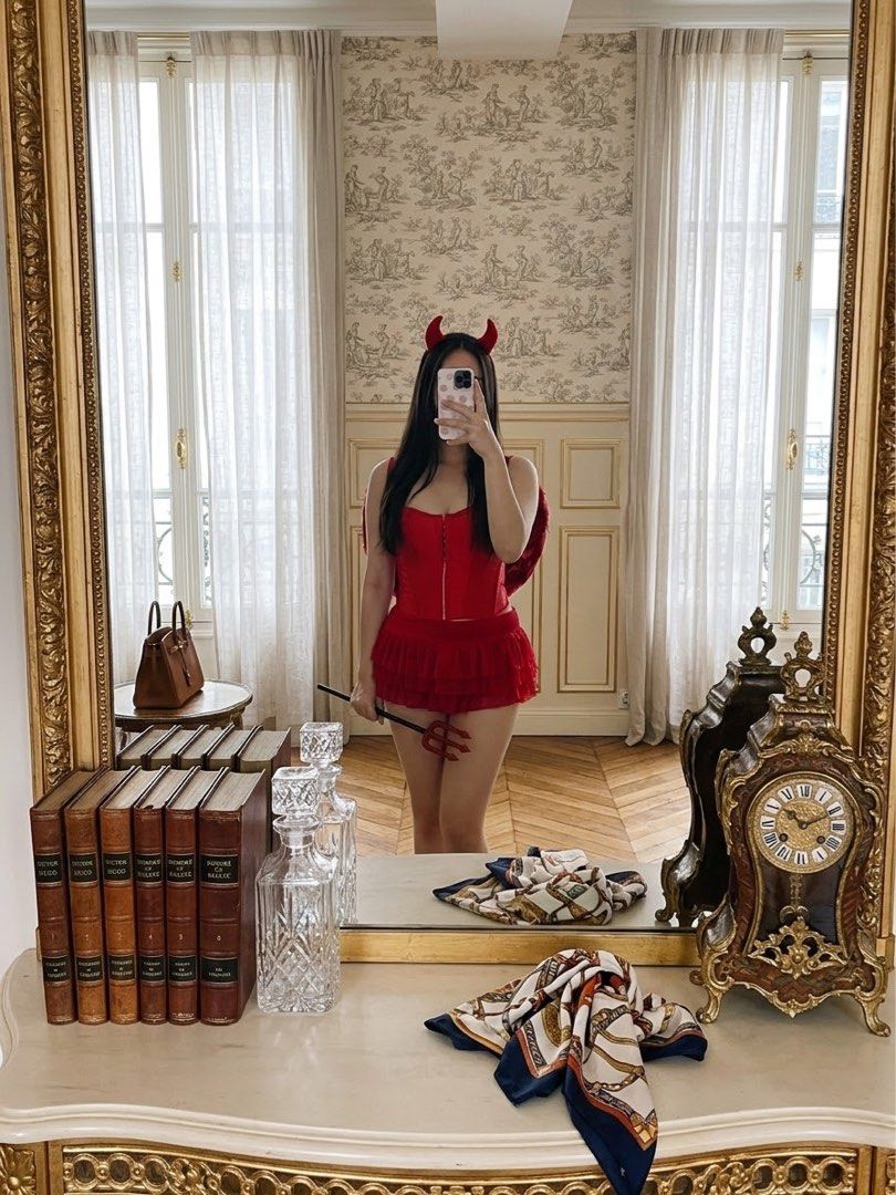 Red Angel / Devil Sexy halloween costume (Category: Dresses) located in Cavite. Submitted by wishie_collects (Listing ID 1470629262, Image 1). Description: Xs Only Xs Pretty little thing Corset with Boning low rise Ruffled mesh skirt Pair of red fingerless mesh gloves Bunny ears.