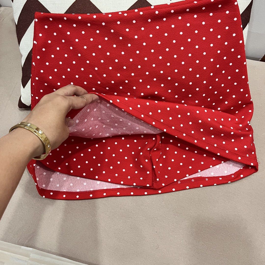 Red Polka Dot Skort (Category: Skirts) located in Manila. Submitted by mjsappstopandshop (Listing ID 1470694399, Image 2). Description: - Color: Bright red with white polka dots - Design: Skirt front with built-in shorts underneath for easy movement - Waistband: Comfortable elastic waist - Fabric: Lightweight and breathable - Styling: Best paired with a simple white top and sneakers.
