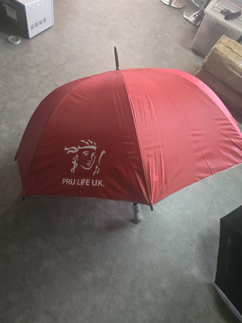 Red Regular Golf Umbrella (Category: Umbrellas) located in Makati City. Submitted by goldenbird.001 (Listing ID 1470638760, Image 2). Description: has company logo on canopy selling low.