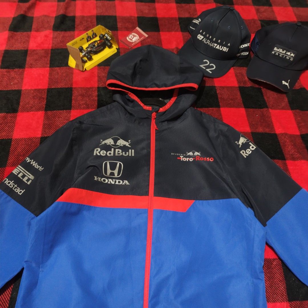 REDBULL F1 TORRO ROSSO TEAM RAIN JACKET (Category: Coats, Jackets and Outerwear) located in Subic. Submitted by racearchives_jep (Listing ID 1470580249, Image 2). Description: 21x28 minimal hairline.