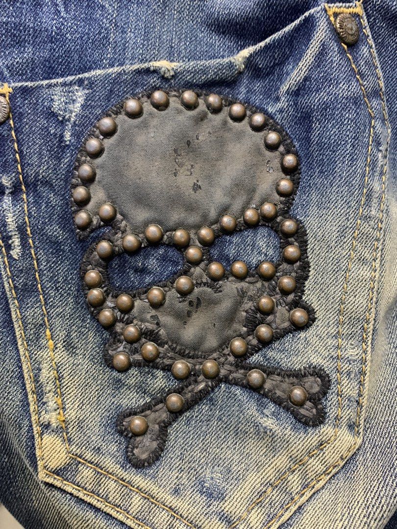 REDPEPPER Y2K JEANS (Category: Jeans) located in Caloocan City. Submitted by thriftz2.spaze (Listing ID 1470659928, Image 3). Description: Red Pepper Y2K-style distressed straight-leg denim jeans featuring skull and crossbones embroidery, metal stud details, and a branded waist patch Waist: 32 in Length: 44.5 in Hips: 38.5 in Open Leg: 7.5 in Rise: 9 in.
