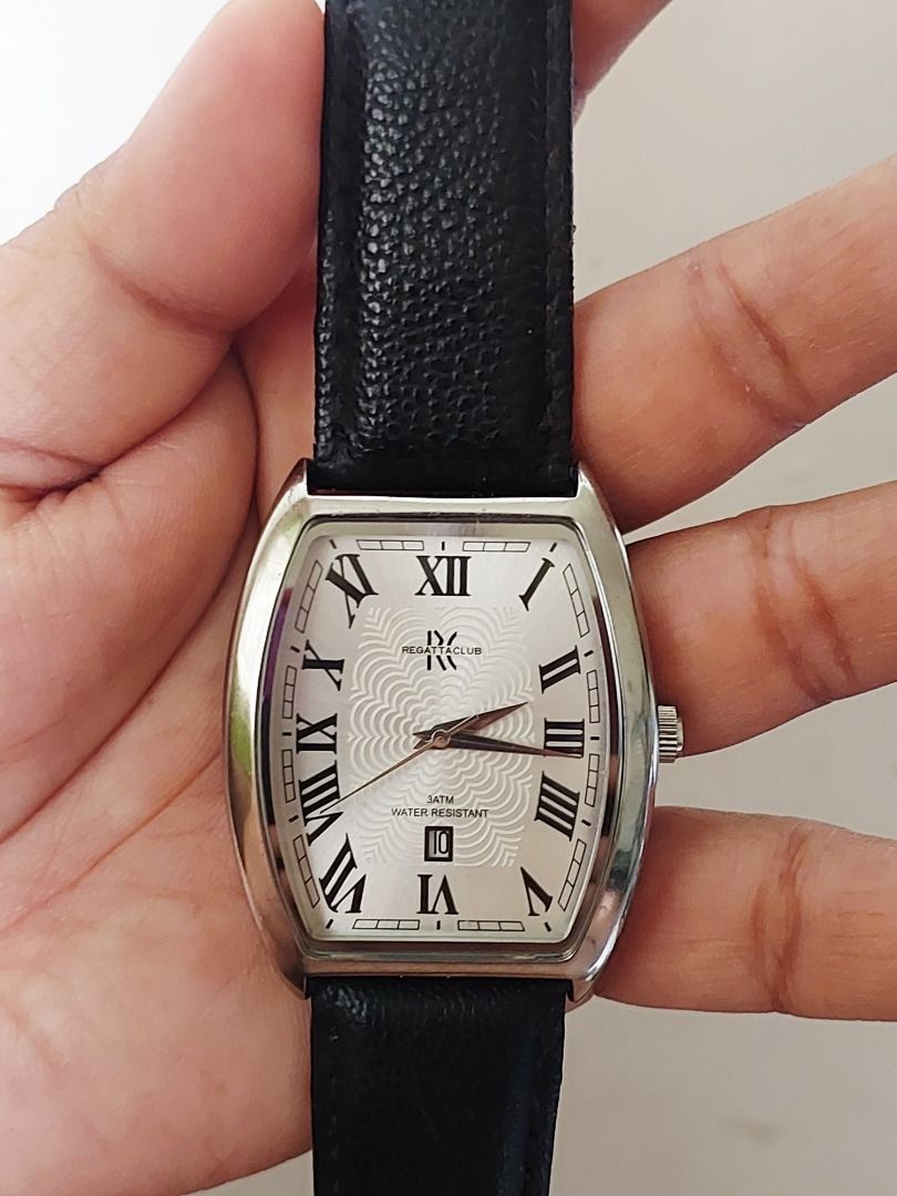 Regatta Club Rectangular Roman Numeral Quartz Watch Black Strap (Category: Luxury Watches) located in Batangas. Submitted by vintageanddainty (Listing ID 1470583969, Image 2). Description: - Brand/Model: Regatta Club dress watch - Design: Rectangular silver-tone case with a textured white dial and classic Roman numerals - Features: Date window at the bottom, stainless steel case back, and 3ATM water resistance - Condition: Runs well; please note 