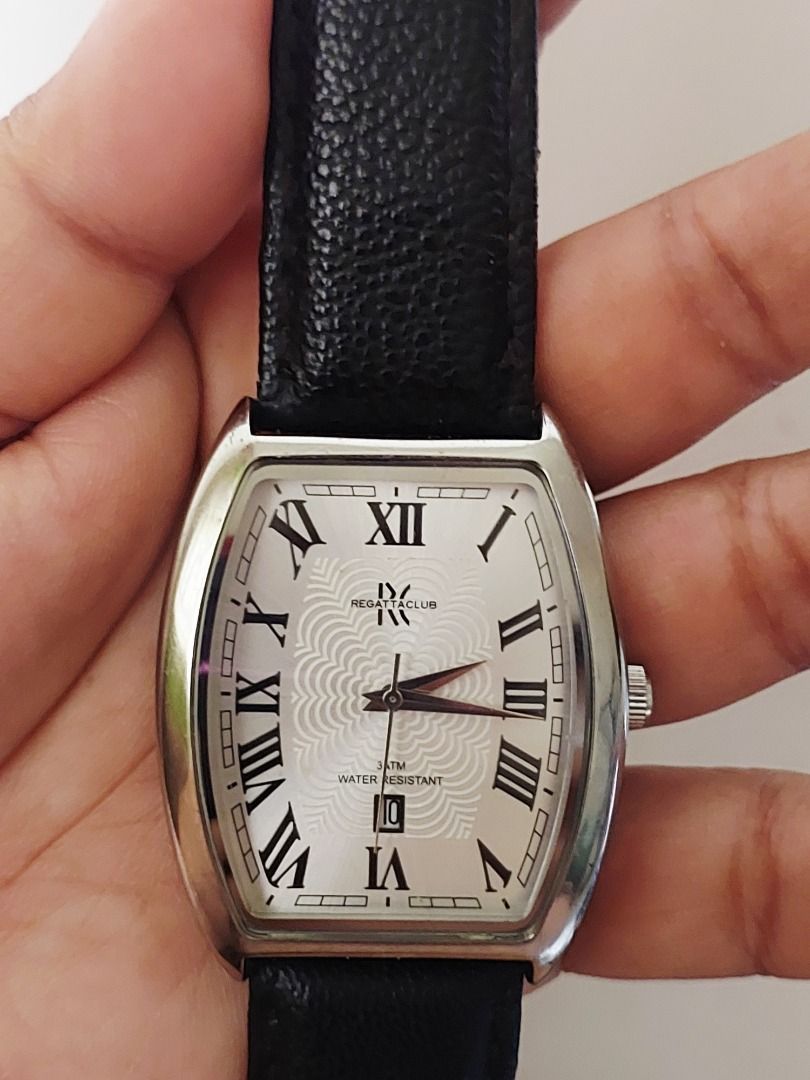 Regatta Club Rectangular Roman Numeral Quartz Watch Black Strap (Category: Luxury Watches) located in Batangas. Submitted by vintageanddainty (Listing ID 1470583969, Image 1). Description: - Brand/Model: Regatta Club dress watch - Design: Rectangular silver-tone case with a textured white dial and classic Roman numerals - Features: Date window at the bottom, stainless steel case back, and 3ATM water resistance - Condition: Runs well; please note 