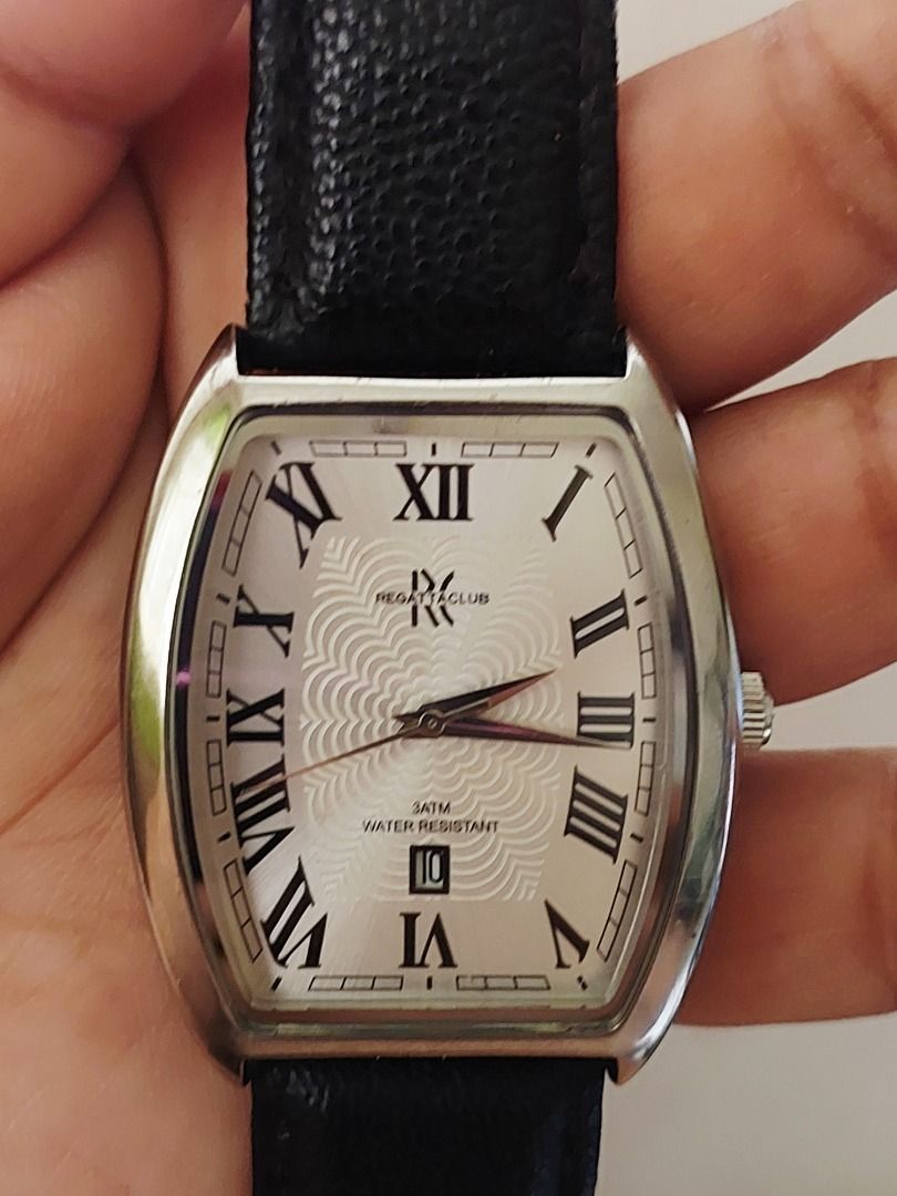 Regatta Club Rectangular Roman Numeral Quartz Watch Black Strap (Category: Luxury Watches) located in Batangas. Submitted by vintageanddainty (Listing ID 1470583969, Image 3). Description: - Brand/Model: Regatta Club dress watch - Design: Rectangular silver-tone case with a textured white dial and classic Roman numerals - Features: Date window at the bottom, stainless steel case back, and 3ATM water resistance - Condition: Runs well; please note 