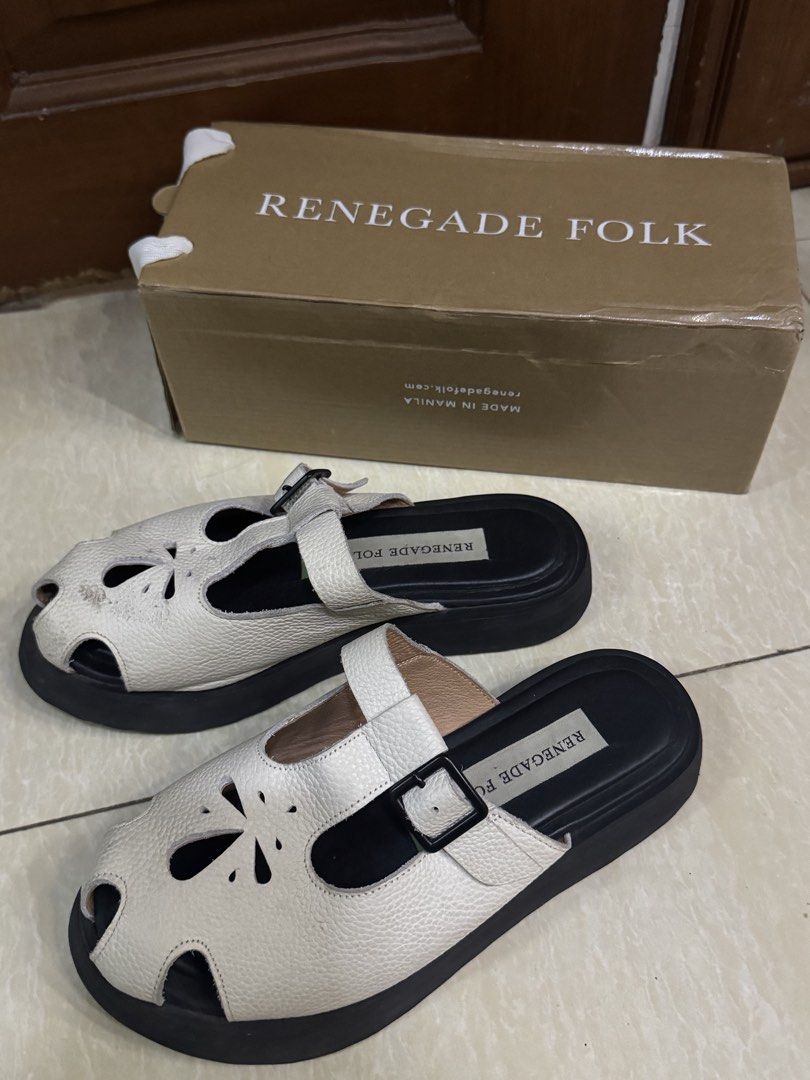 RENEGADE FOLK Chunky Mules - White Size 8 (Category: Sandals) located in Davao. Submitted by weargels (Listing ID 1470673997, Image 3). Description: Purchased from a seller here for ₱4350 With free box Needs cleaning Check website’s chart for this specific style which is true to size. ‼️ RFS: Chose the wrong size and declutterring.