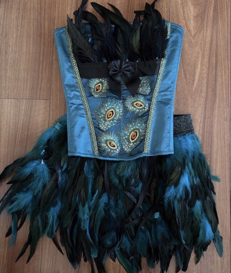 RENT: Peacock Halloween Costume (Category: Sets or Coordinates) located in Marikina City. Submitted by tiffanygenato (Listing ID 1470589140, Image 2). Description: PEACOCK 🦚 BLOCKED DATES OCT 29 (Oct 27, 28, 30, 31) ₱599 rent + ₱1,500 key deposit Includes the peacock corset & peacock skirt | NO WINGS 🪽 Rent the additional: A. Peacock fan ₱100 B. Black Glitter Heels ₱400 size 39 | ₱1,500 key deposit C. Blue Heels ₱400 size 39 | ₱1,500 key deposi