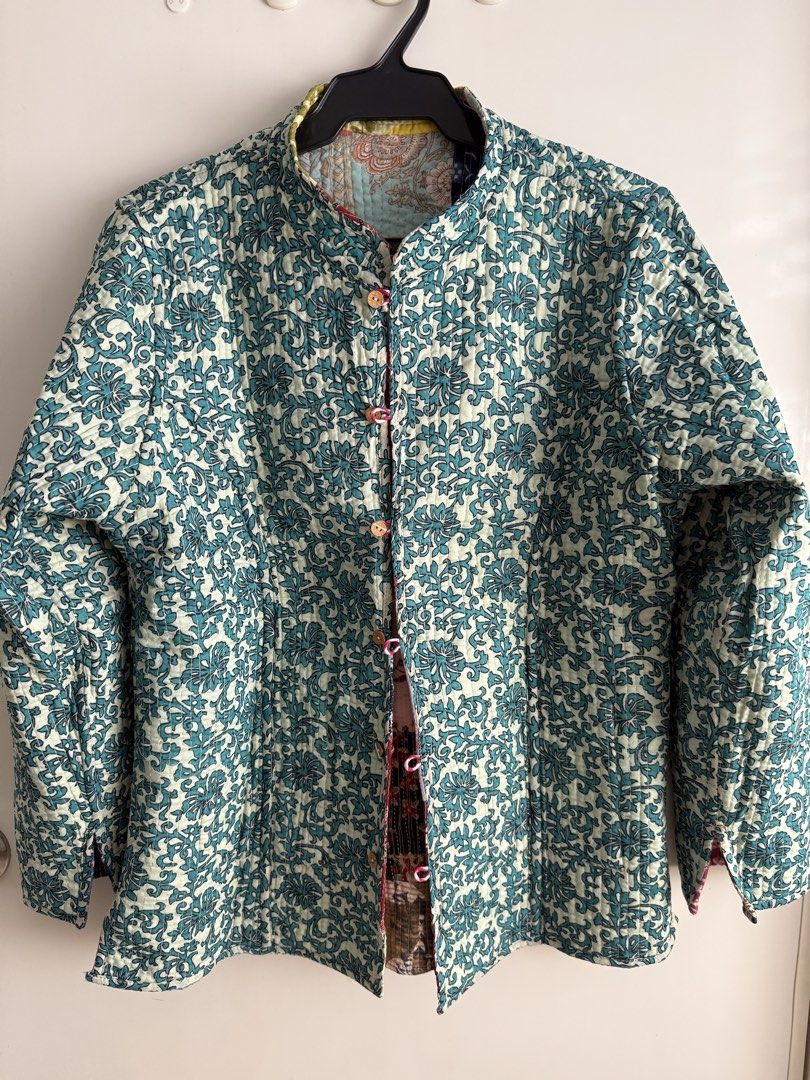 Reversible Quilted Patchwork Jacket (Category: Coats, Jackets and Outerwear) located in Las Pinas. Submitted by katrt (Listing ID 1470597962, Image 3). Description: - Condition: Brand new with tag attached - Size: L (Made in India) - Material: 100% cotton - Design: Reversible (Colorful patchwork print on side one, turquoise floral pattern on side other) - Features: Front button closure with looped fastenings and two front pockets on the patchwork